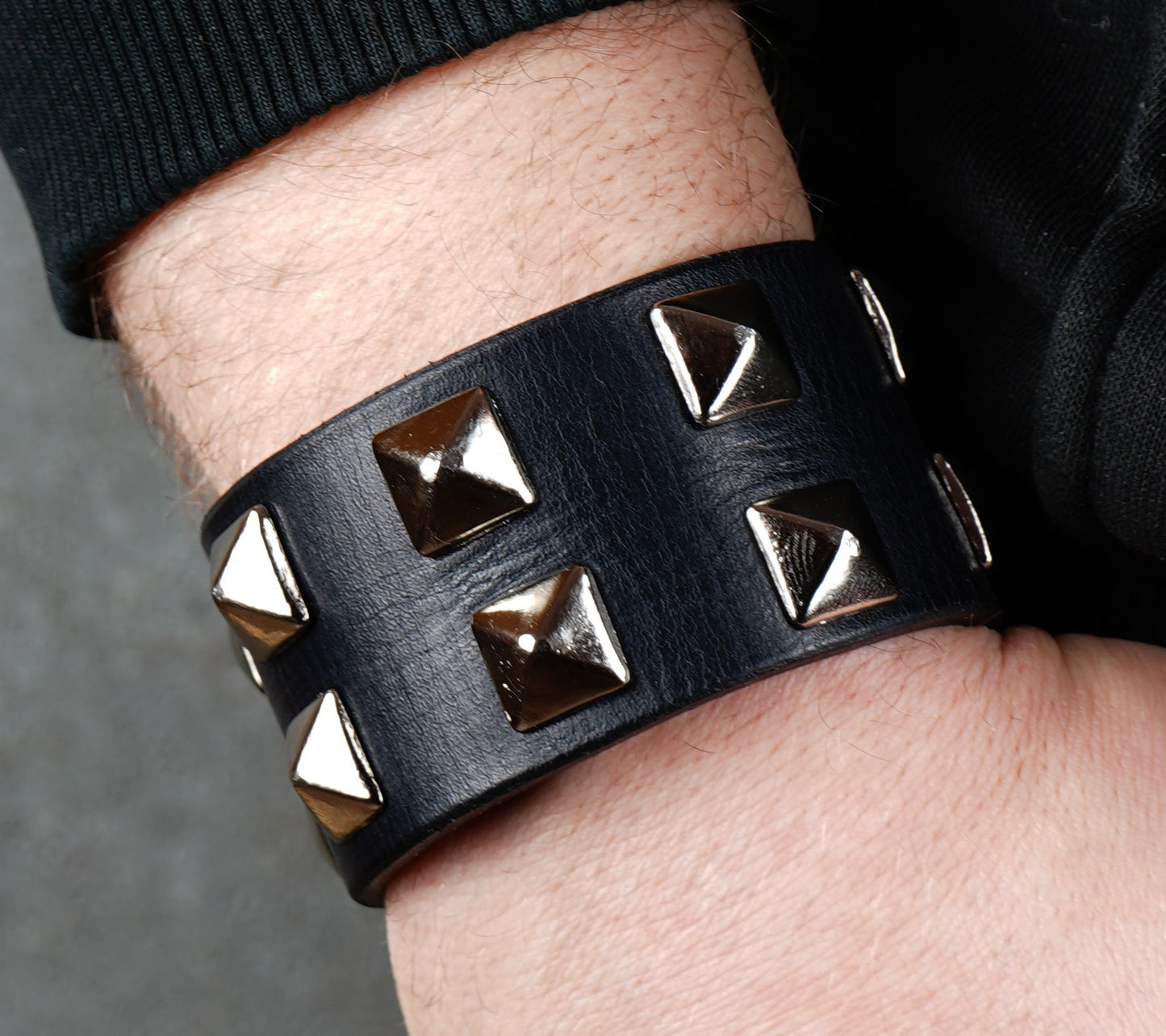 black leather studded bracelet close-up