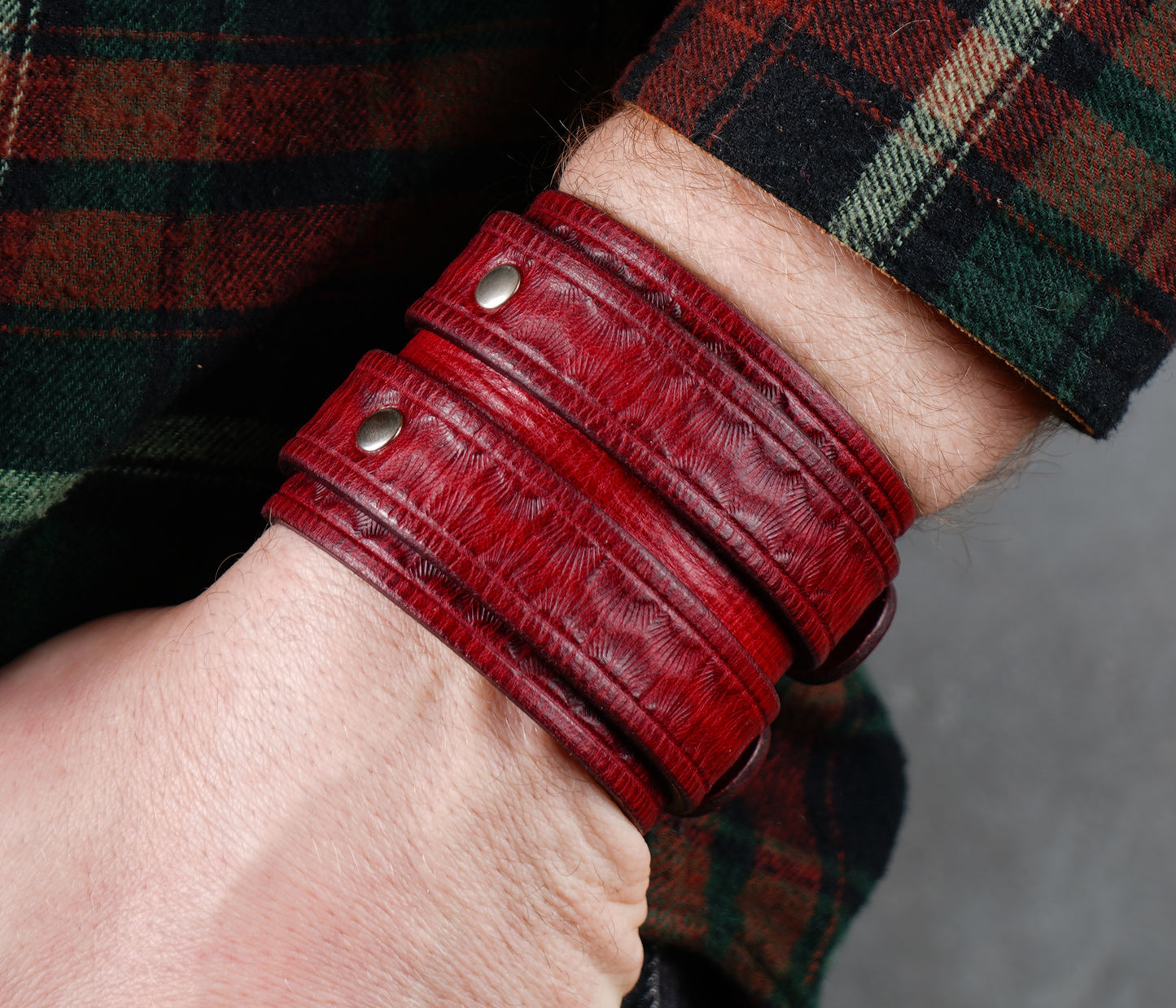 handmade wide red leather bracelet close up
