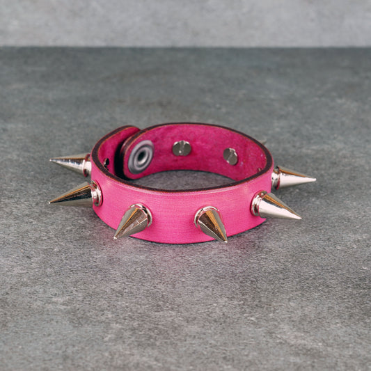 Spiked pink leather bracelet made from genuine leather