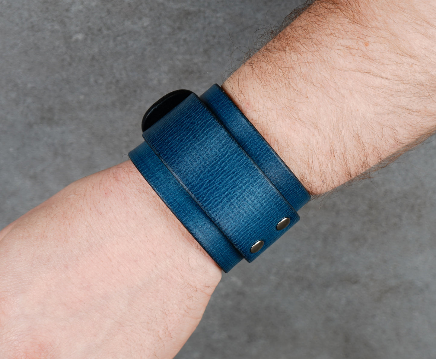 Wide blue leather cuff with buckle