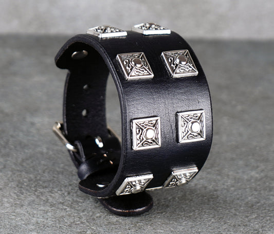 Black leather bracelet with silver geometric studs 