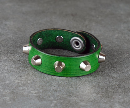 Green leather bracelet with metallic studs