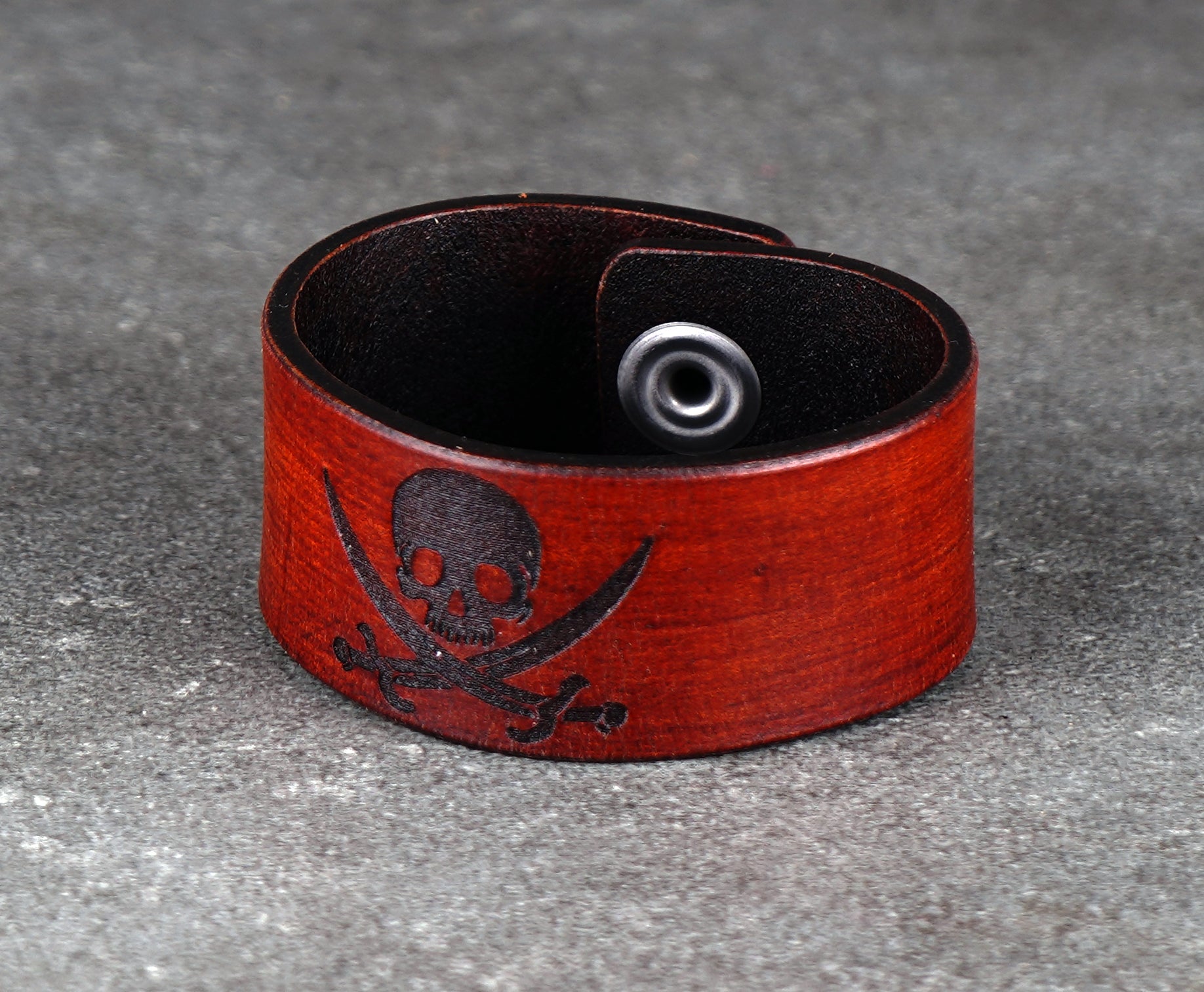 Brown Jolly Roger leather bracelet crafted from high‑quality leather