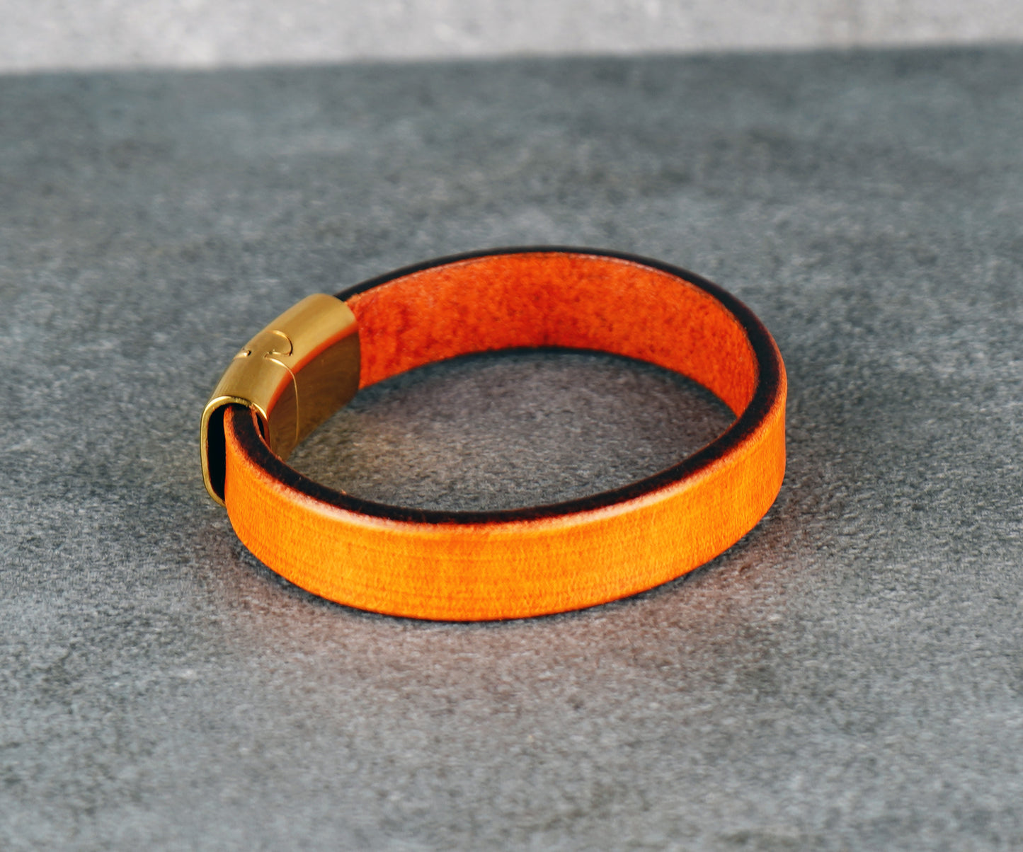 Orange Leather Bracelet with Metal Clasp – Handcrafted Vegetable‑Tanned Wrist Accessory