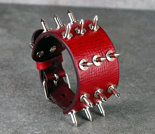 red leather bracer with spikes
