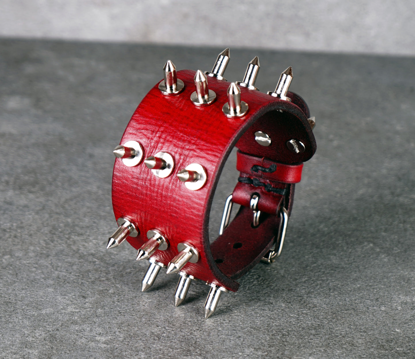 red leather bracer with spikes