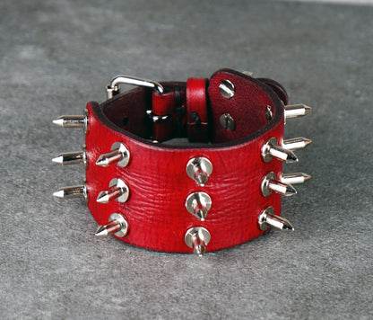 adjustable red spiked leather wrist cuff