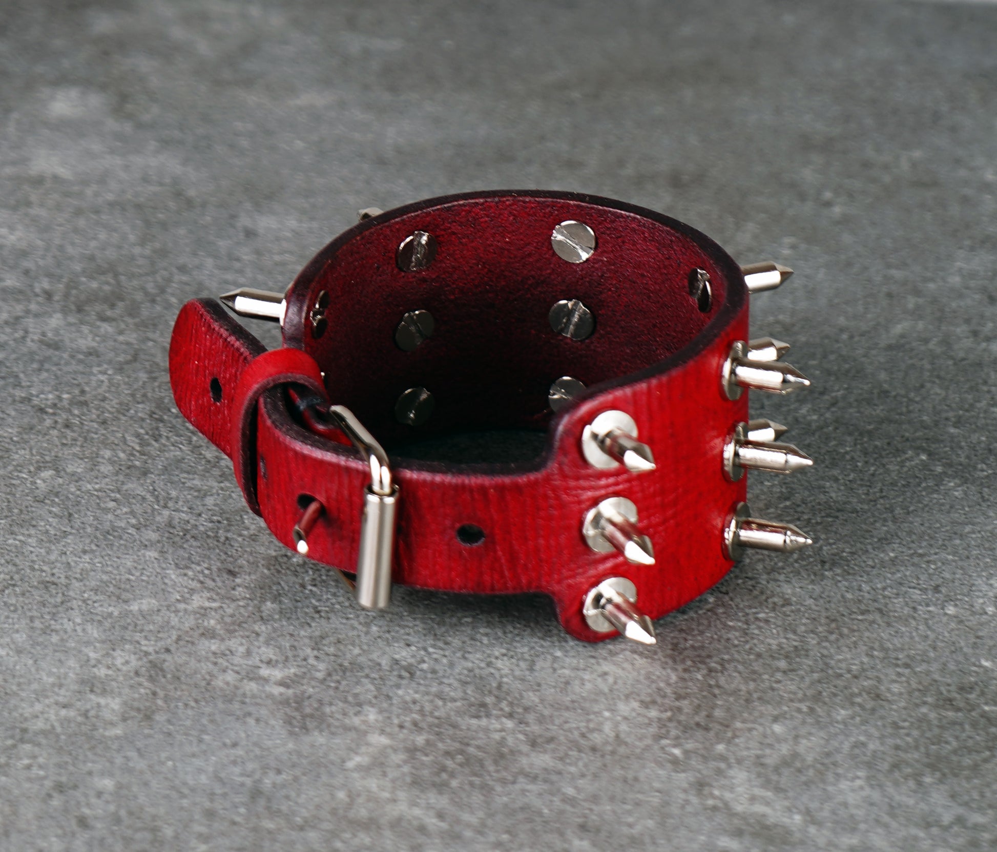 heavy duty red leather spike bracelet