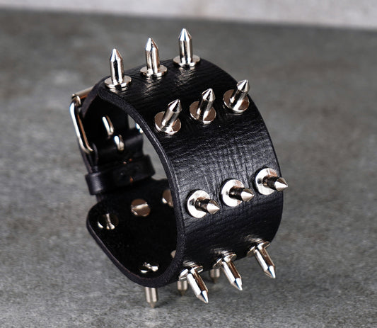 black leather bracers with metal spikes