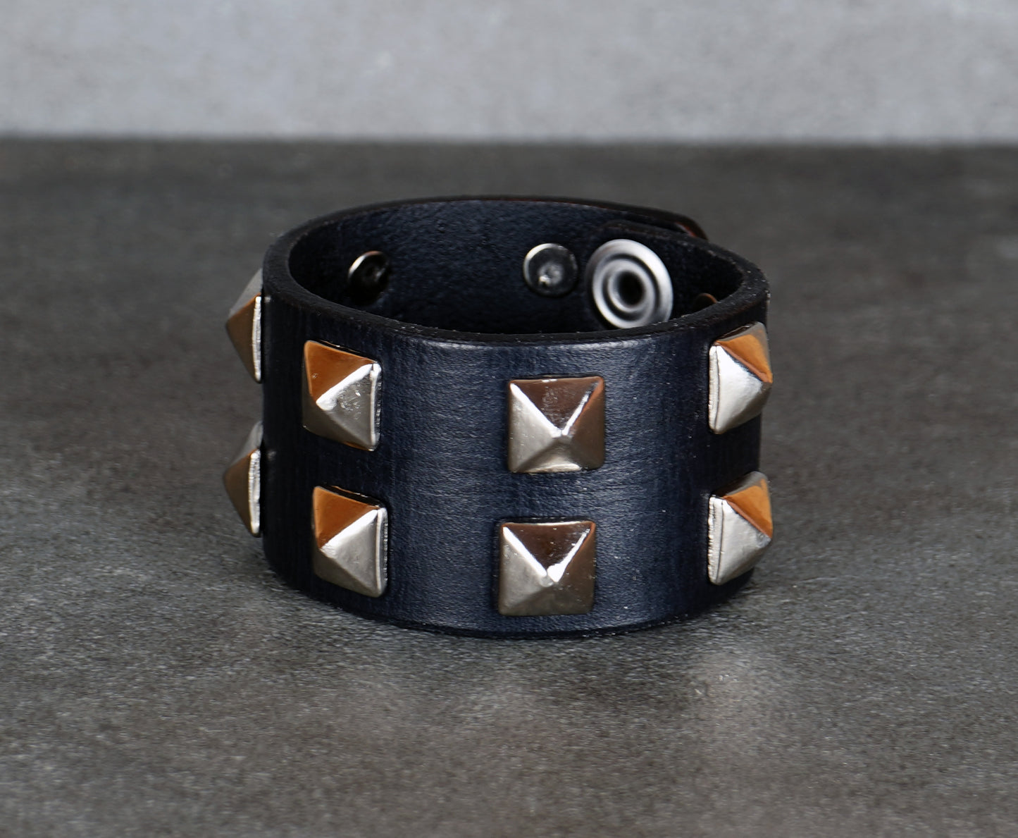black leather studded bracelet close-up
