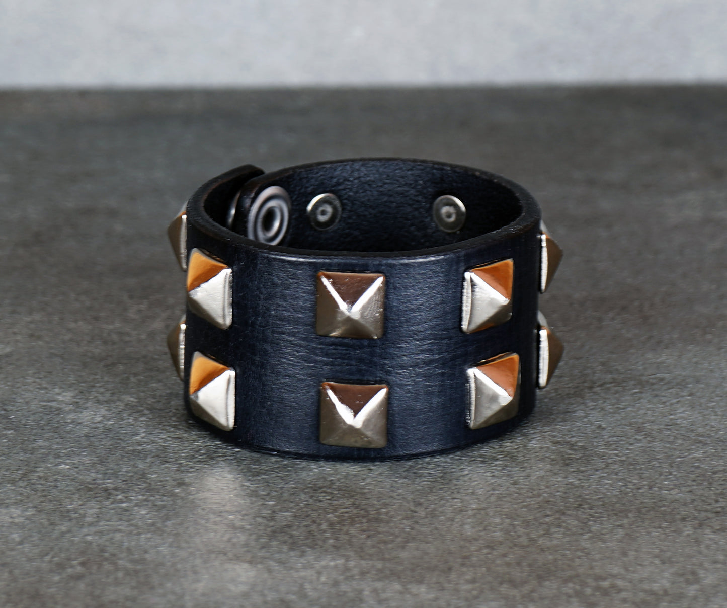 black leather studded bracelet close-up