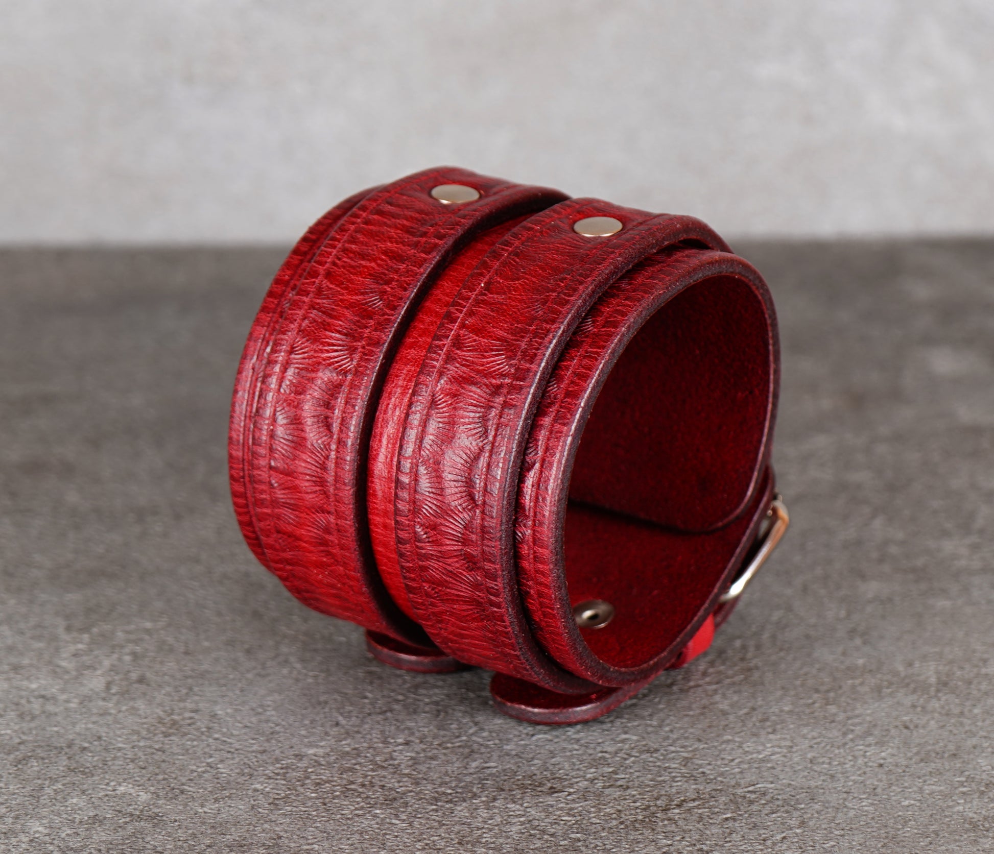 handmade  wide red leather bracelet close up