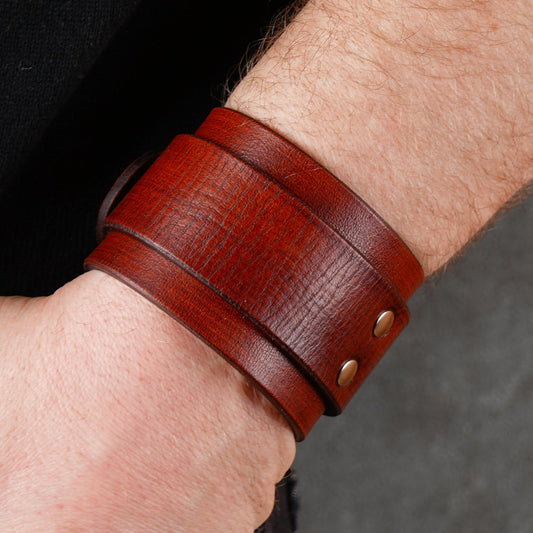 Wide brown leather cuff with buckle