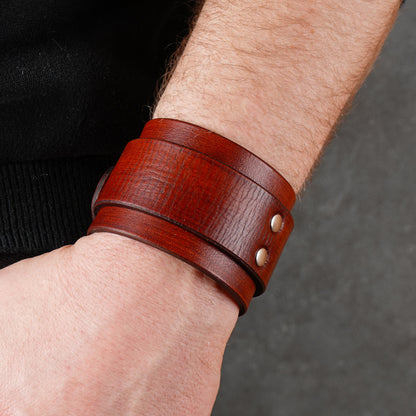 Wide brown leather cuff with buckle