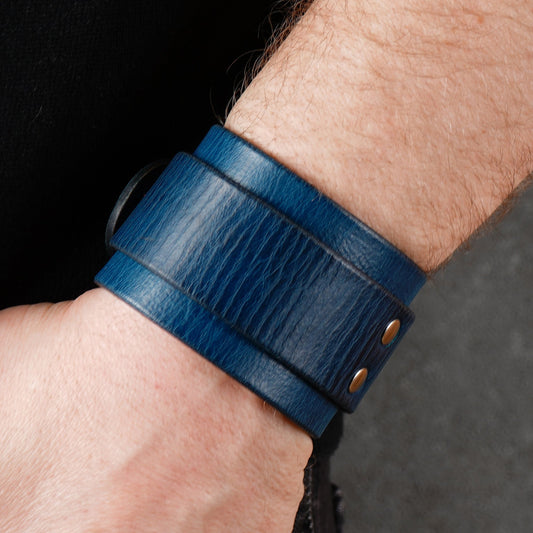 Wide blue leather cuff with buckle