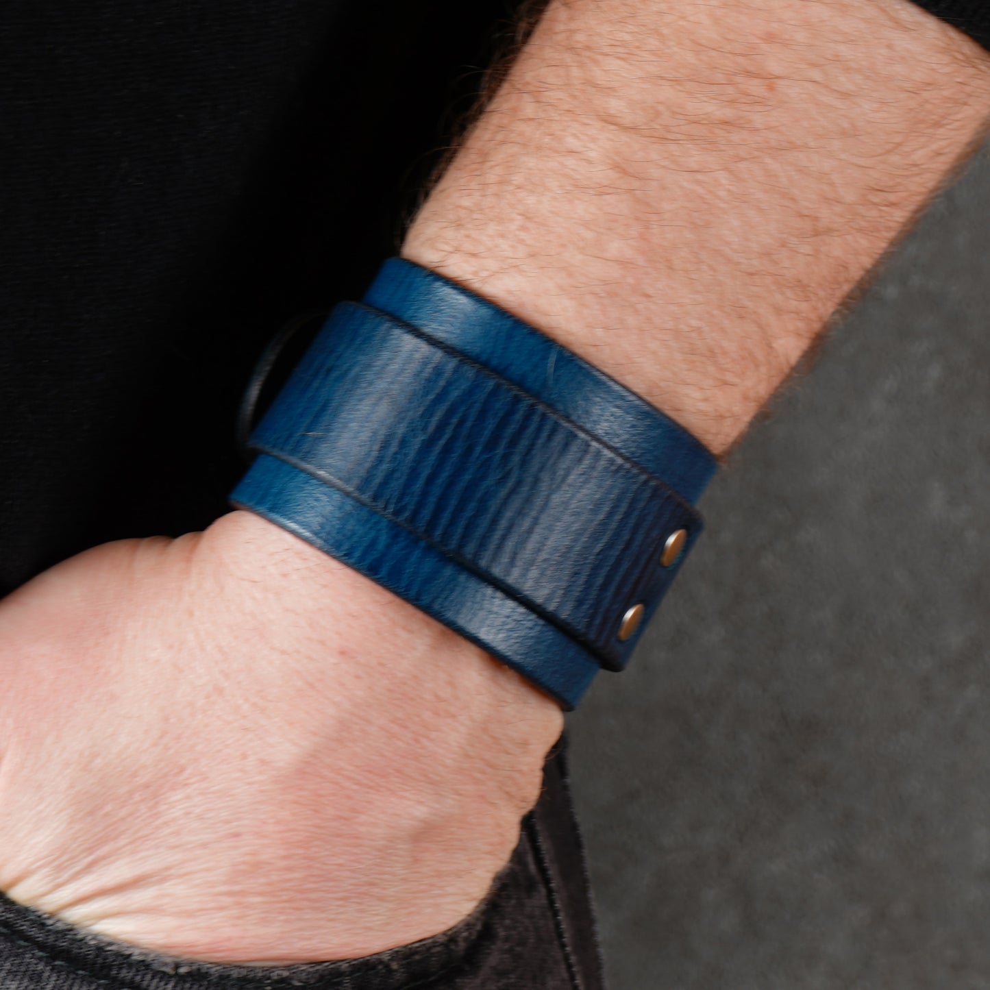 Wide blue leather cuff with buckle
