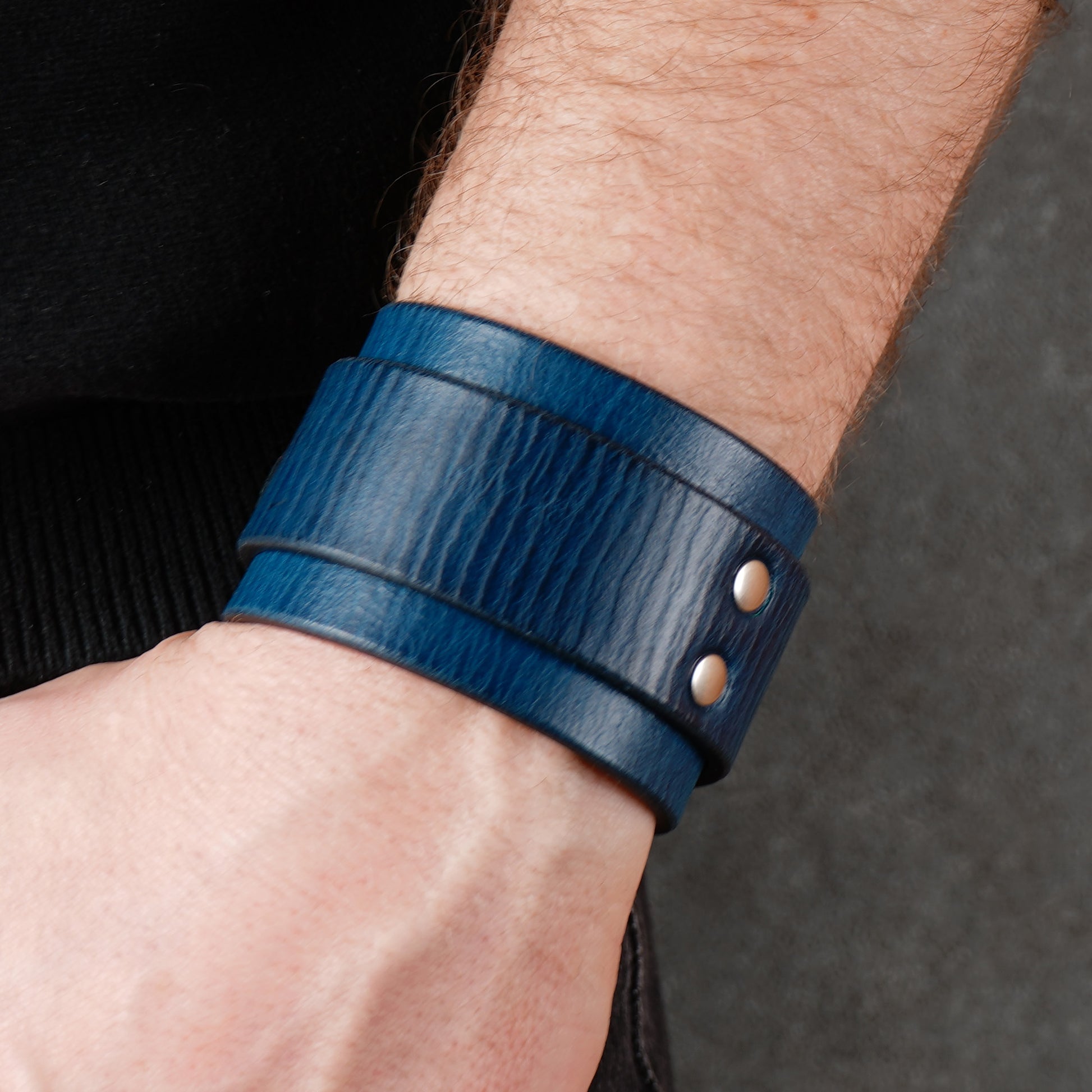 Wide blue leather cuff with buckle