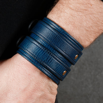 Blue leather cuff bracelet with two buckles