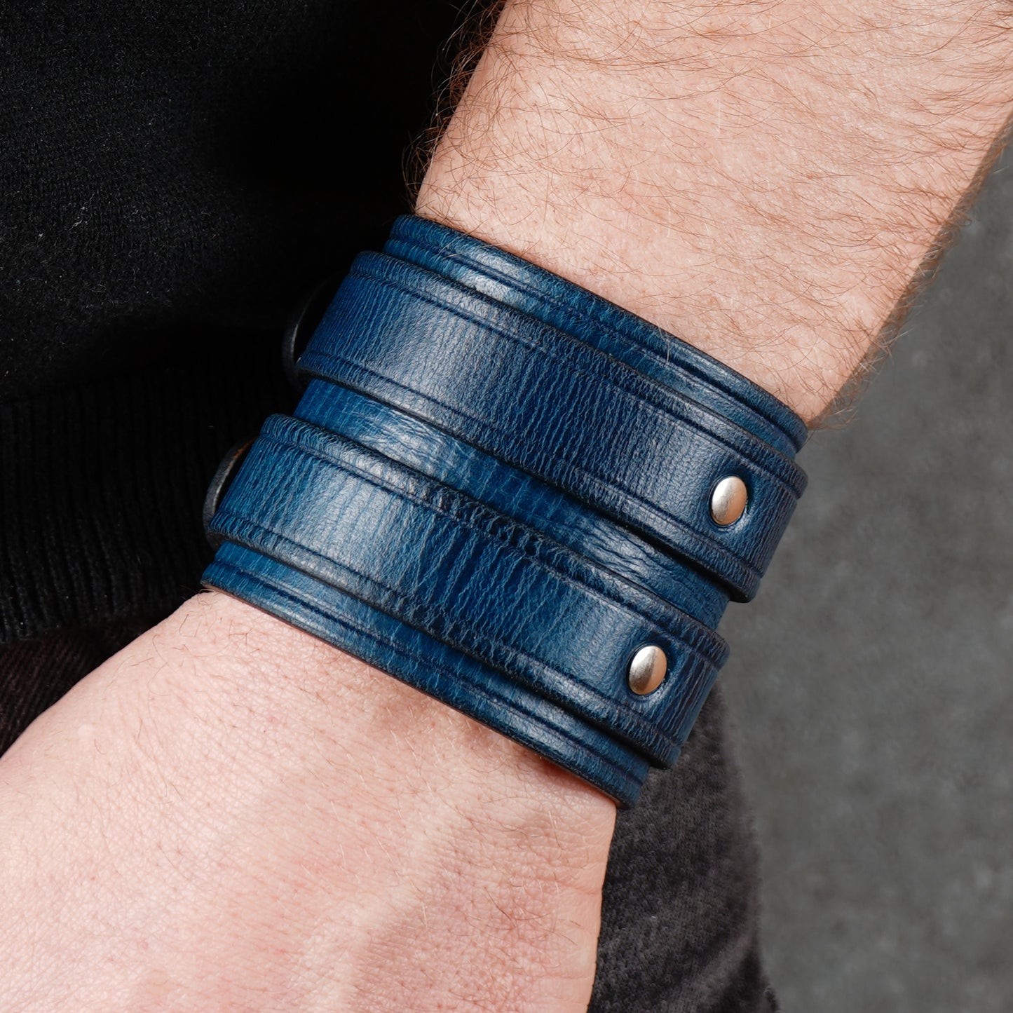 Blue leather cuff bracelet with two buckles