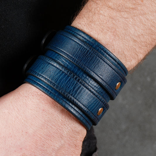 Blue leather cuff bracelet with two buckles