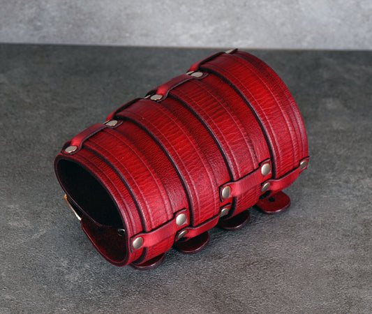 Wide red leather cuff bracelet handmade from vegetable-tanned leather, minimalist design