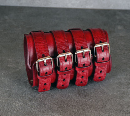 Wide red leather cuff bracelet handmade from vegetable-tanned leather, minimalist design