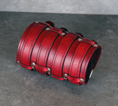 Wide red leather cuff bracelet handmade from vegetable-tanned leather, minimalist design