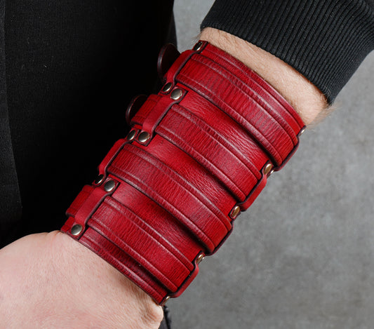 Wide red leather cuff bracelet handmade from vegetable-tanned leather, minimalist design