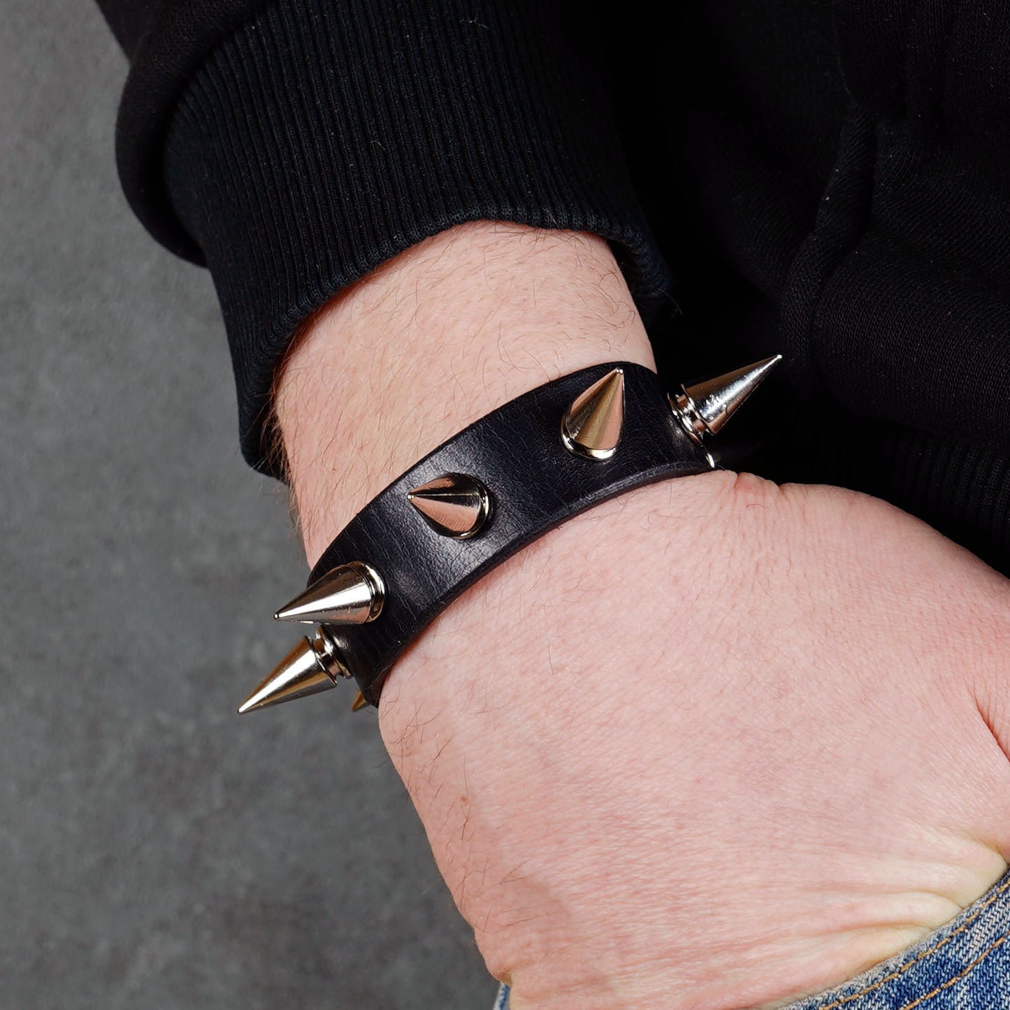 Gothic punk black leather wristband with metal spikes