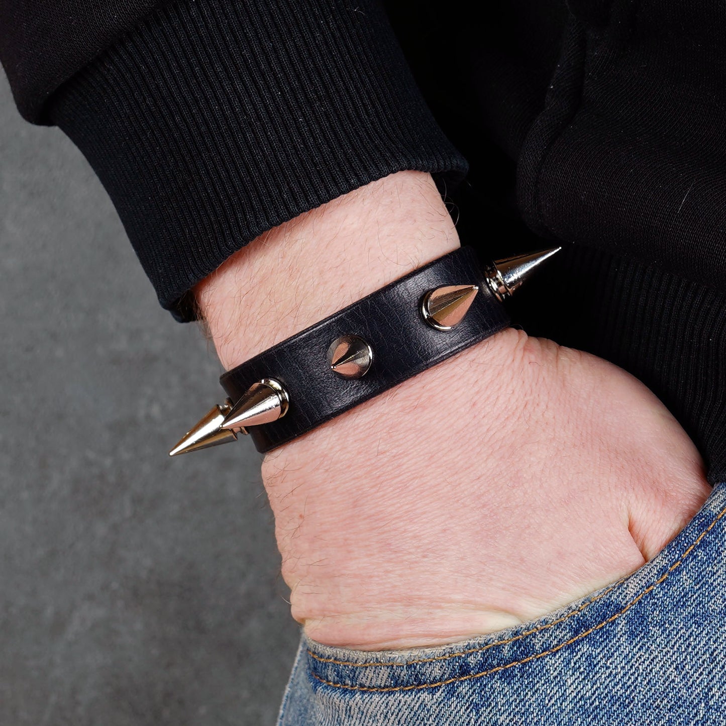 Gothic punk black leather wristband with metal spikes