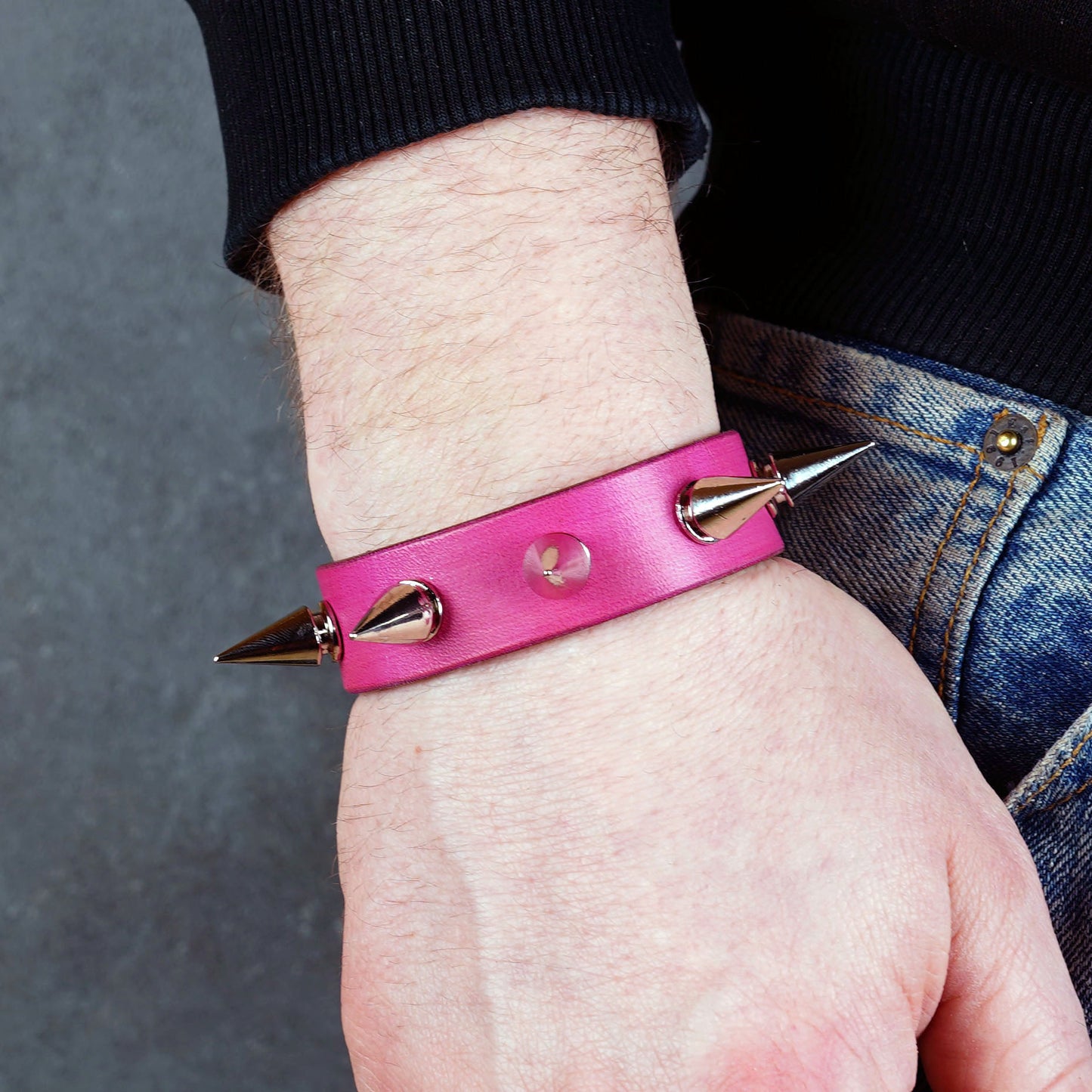 Spiked pink leather bracelet made from genuine leather
