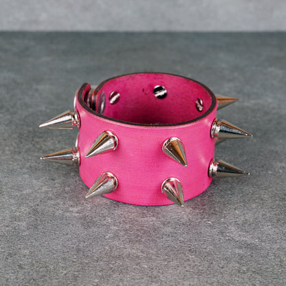 Pink studded leather bracelet made from genuine Italian leather