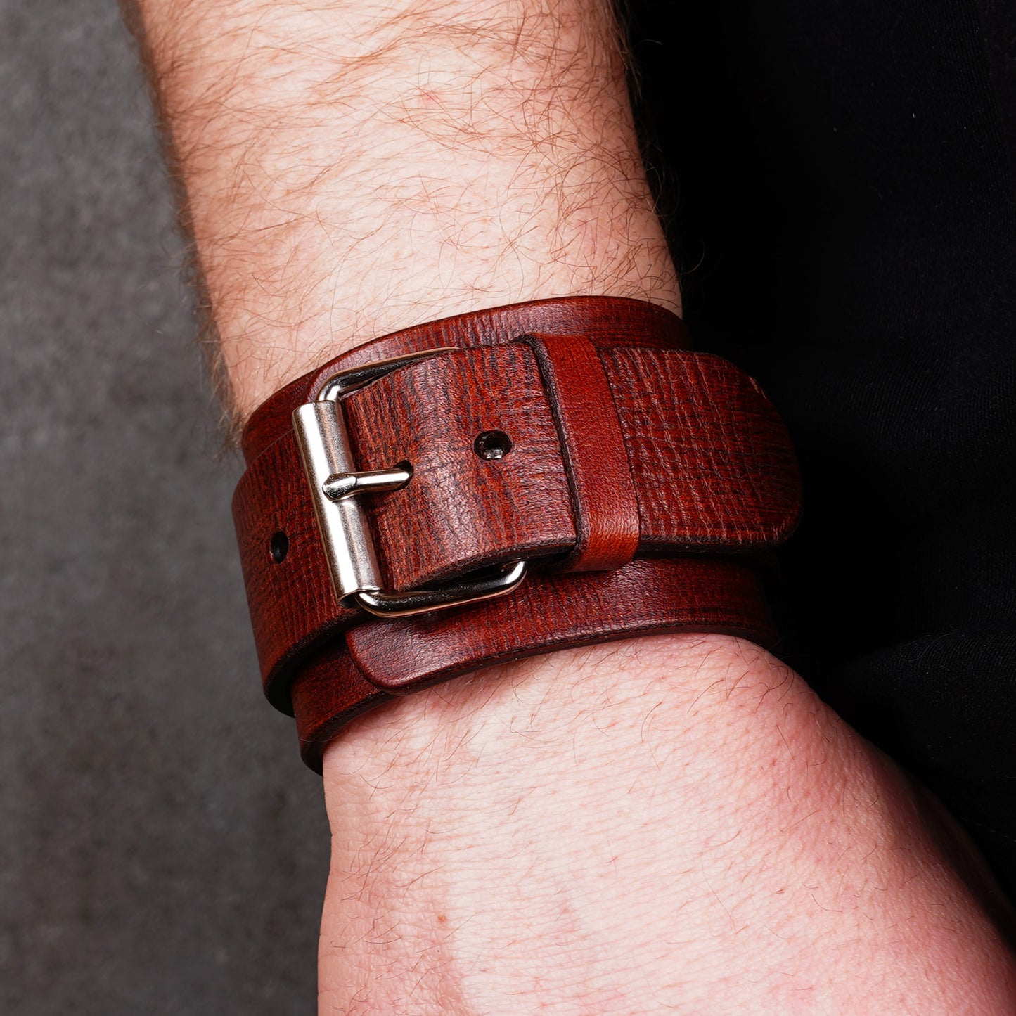 Wide brown leather cuff with buckle