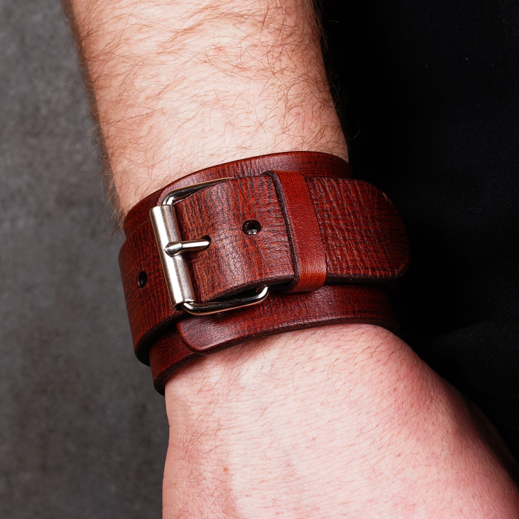 Wide brown leather cuff with buckle