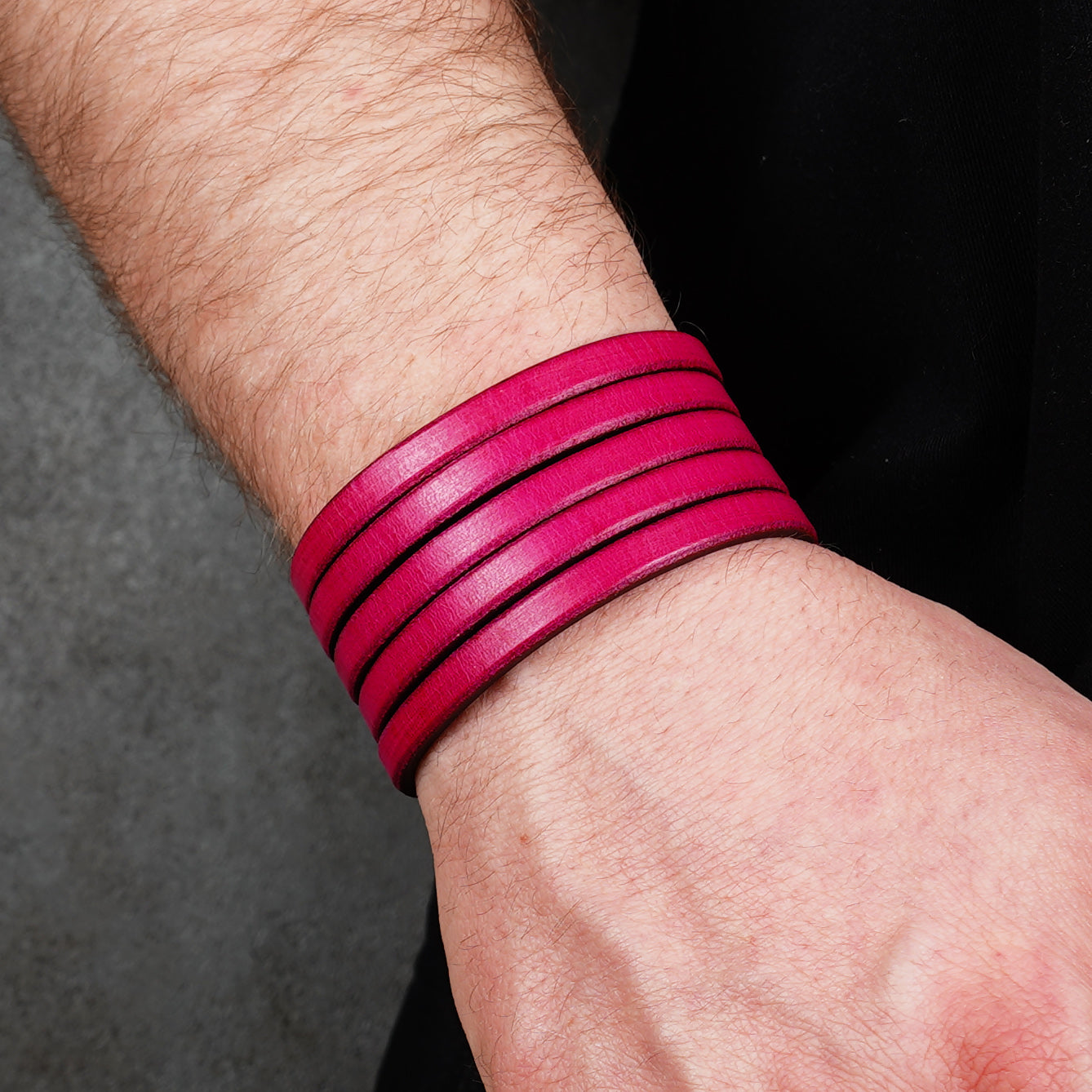 Pink leather wrap bracelet worn on wrist, handmade genuine leather cuff bracelet with layered strap design, minimalist magenta wristband for men and women
