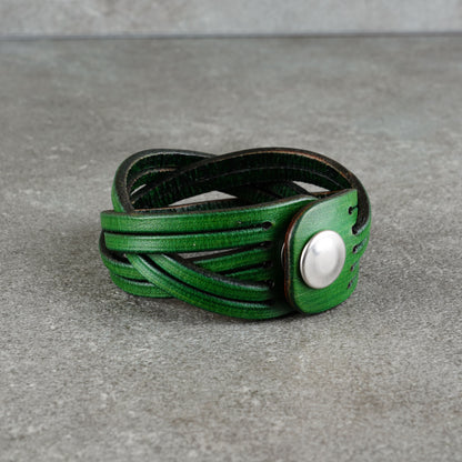 Low, centered view of the bracelet with the snap fastener at the side