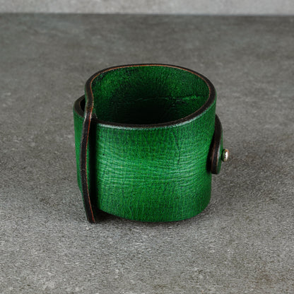 Front-facing view of the cuff showing its open shape and hardware