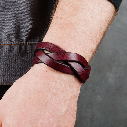 Worn bracelet close-up with the layered strap weave across the wrist