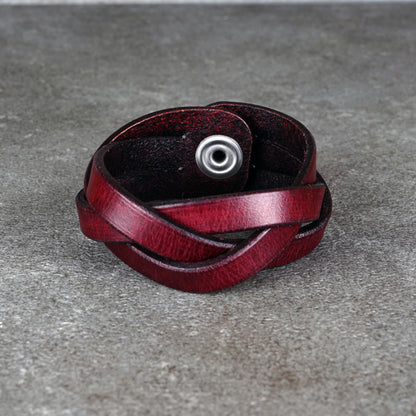 Top view of the bracelet highlighting the metal snap and inner leather