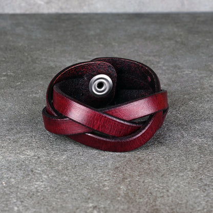 Studio view of the bracelet standing tall with the snap facing forward